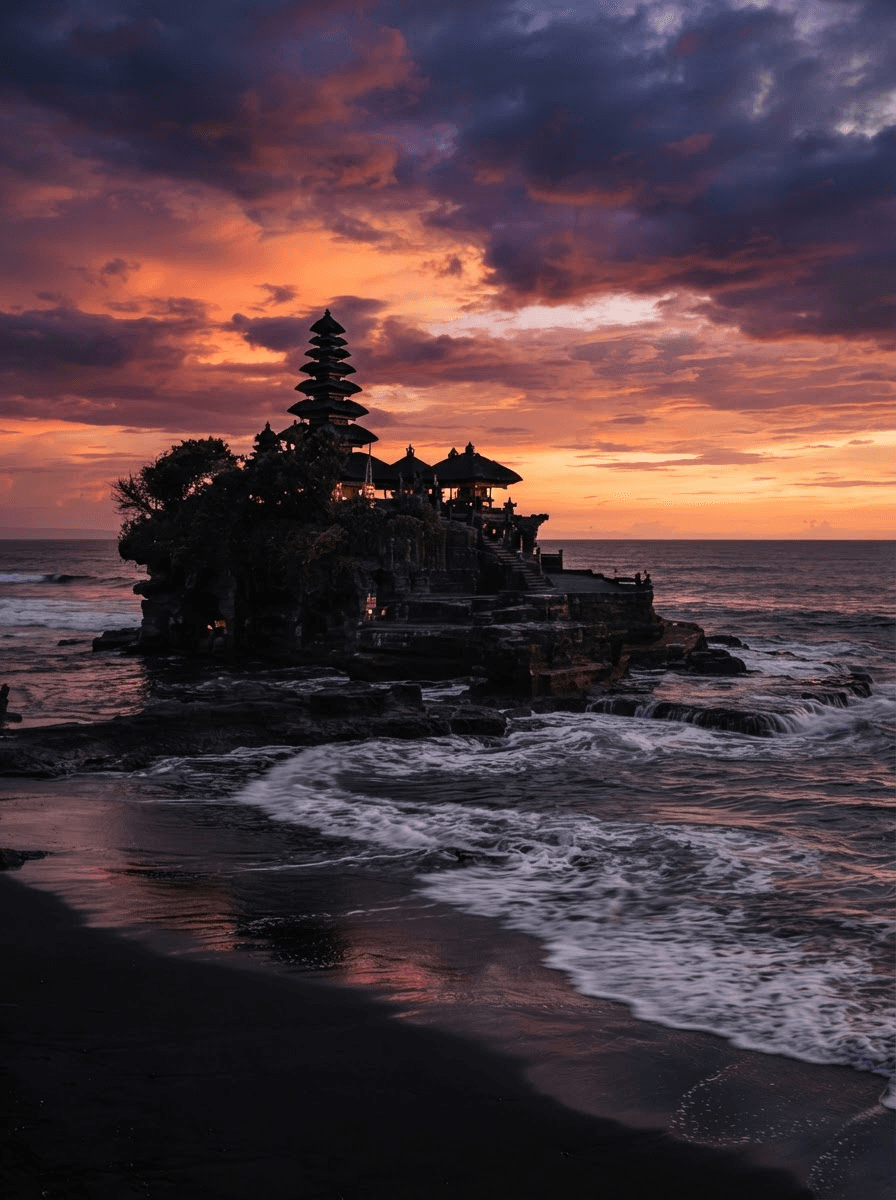 Balinese sea temple silhouetted against an orange-purple dusk over black sand